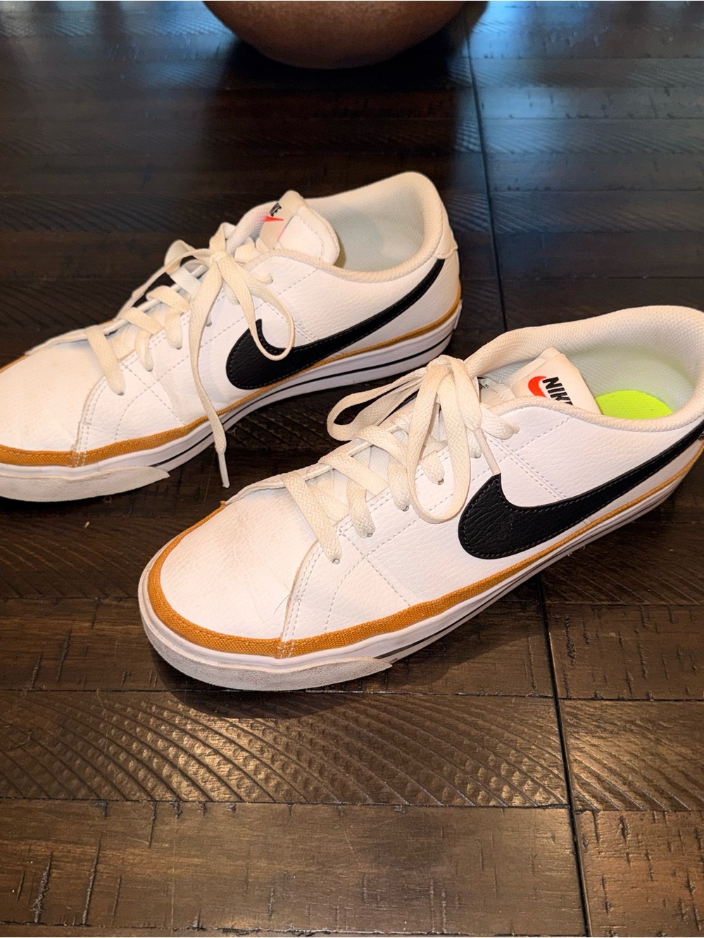 Nike White Sneakers with Black Swoosh and Brown Trim